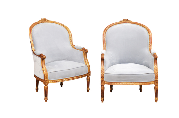 SOLD:  Pair of French Louis XVI Style Gilded Bergère Chairs with Pierre Frey Upholstery