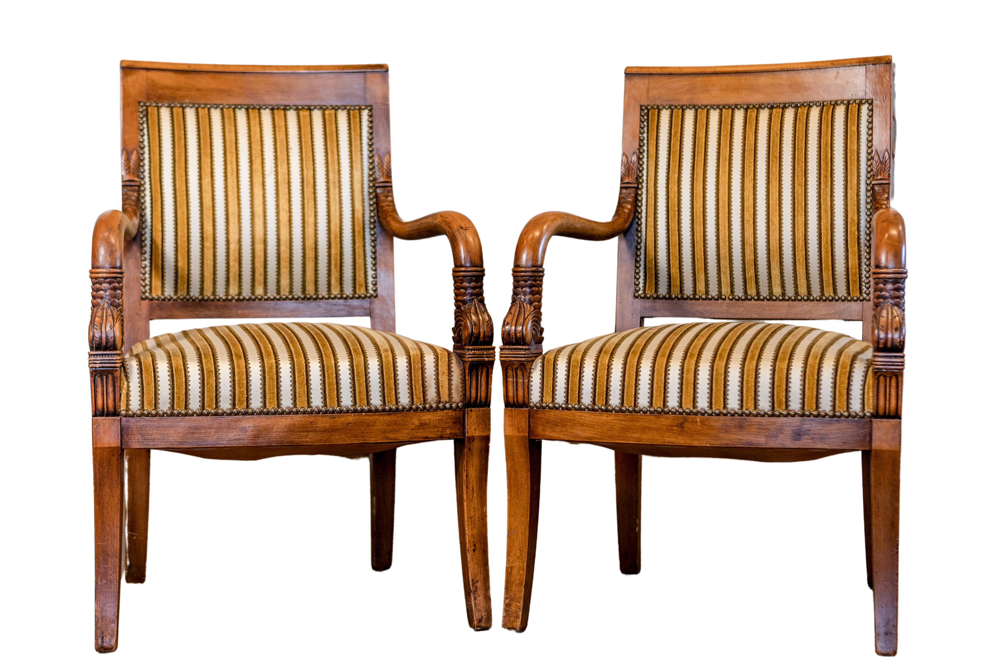 Pair of Empire Style French Armchairs with Foliage Carved Arms and Saber Legs