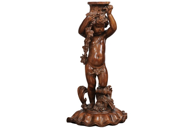 French Napoléon III 1860s Carved Walnut Sculpture of a Putto Carrying a Vessel