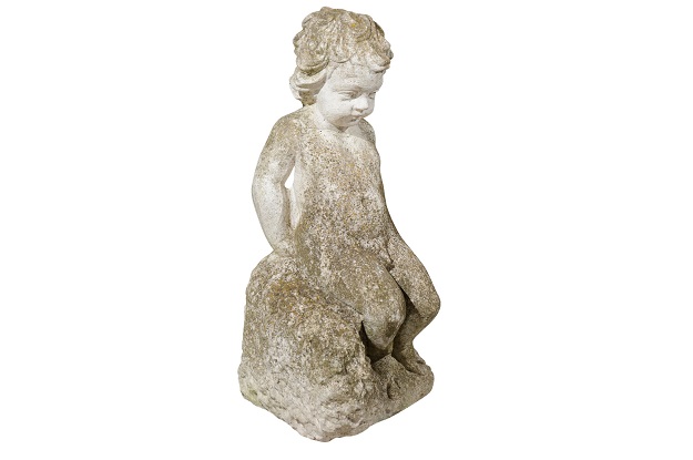 Swedish Carved Stone Garden Sculpture of a Putto Sitting on a Rock, 20th Century