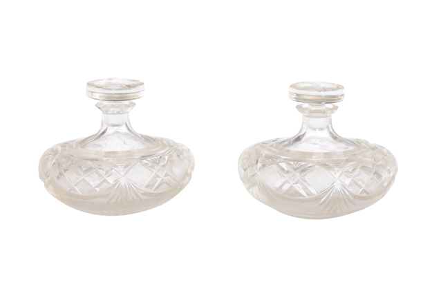 Pair of French 19th Century Baccarat Crystal Perfume Bottles with Cutaway Motifs